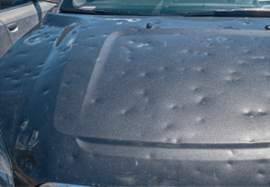 A car in Howell that received Hail damaged and needs body repair